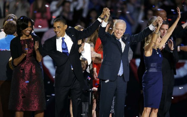 president-barack-obama-first-lady-michelle-obama-vice-president-joe-biden-and-jill-biden-acknowledge-the-crowd-at-his-election-night-party-wednesday-nov-7-2012-in-chicago-president-obama-defeated-republican-challenger-former-massachusetts-gov-mitt-romney-ap-photochris-carlson