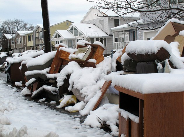 four-inches-of-snow-covers-piles-of-debris-from-superstorm-sandy-in-point-pleasant-beach-nj-on-thursday-nov-8-2012-a-day-after-a-noreaster-hit-the-storm-weary-state-emergency-dunes-seemed-to-have-held-during-the-recent-storm-and-flooding-that-had-been-feared-did-not-materialize