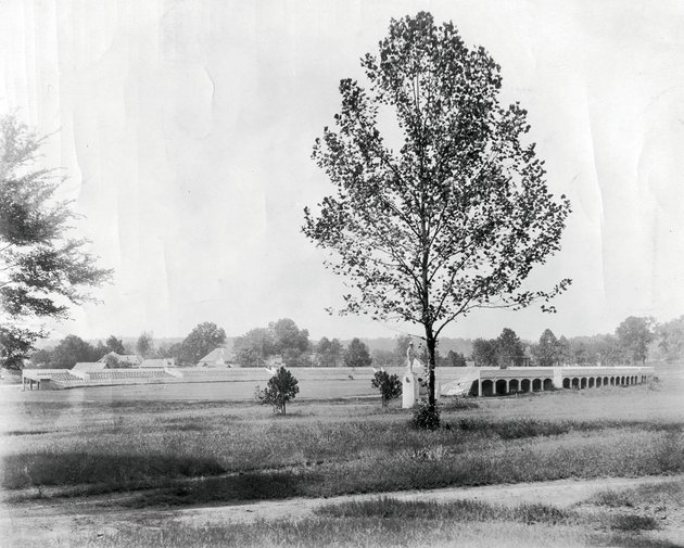 a-statue-of-a-world-war-i-american-doughboy-soldier-stands-outside-the-original-young-memorial-stadium-on-the-hendrix-college-campus-the-school-plans-to-restore-the-statue-and-place-it-outside-the-new-young-wise-stadium-which-is-expected-to-be-constructed-by-september-2013-when-hendrix-plans-to-bring-football-back-to-the-school-as-a-competitive-sport