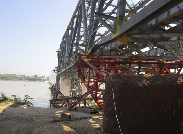 structures-of-a-bridge-under-construction-across-the-irrawaddy-river-east-of-shwebo-myanmar-are-seen-damaged-after-a-strong-earthquake-on-sunday-nov-11-2012-the-magnitude-68-quake-struck-northern-myanmar-on-sunday-collapsing-the-bridge-and-a-gold-mine-damaging-several-old-buddhist-pagodas-and-leaving-as-many-as-12-people-feared-dead-the-bridge-links-the-town-of-sintku-40-miles-north-of-mandalay-on-the-east-bank-of-the-irrwaddy-with-kyaukmyaung-on-the-west-bank