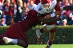 Arkansas football Coach John L. Smith says senior quarterback Tyler Wilson has earned the right to stay in games as long as he wants. 