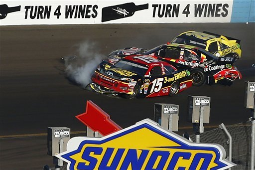 from-left-clint-bowyer-15-jeff-gordon-and-joey-logano-crash-in-turn-4-during-the-nascar-sprint-cup-series-auto-race-at-phoenix-international-raceway-sunday-nov-11-2012-in-avondale-ariz