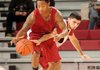 NWA Media/ANTHONY REYES -- Kikko Haydar (20) reaches in on red team's DeQuavious Wagner (23) during the first half of a scrimmage Tuesday, Oct. 30, 2012 at Bud Walton Arena in Fayetteville. 