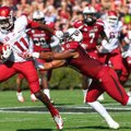 Arkansas Democrat-Gazette/STEPHEN B. THORNTON -- Arkansas' Cobi Hamilton, (11) runs by South Carolin...
