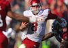 Arkansas Democrat-Gazette/STEPHEN B. THORNTON -- Arkansas QB Tyler Wilson eludes South Carolina defenders in the the third quarter during their game Saturday afternoon in South Carolina. 
