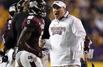 Mississippi State Coach Dan Mullen (right), whose team is 7-3, says it’s important to focus on the bigger picture after each week’s game. “Every situation is extremely unique,” Mullen said.