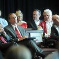 University of Arkansas chancellor G. David Gearhart, from left, athletics director Jeff Long, and fo...