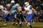 Springdale Har-Ber defensive tackle Josh Frazier (99) is one of the top in-state targets for the 2014 class. 