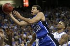 Duke guard Seth Curry (30) shoots over the defense of Kentucky's Julius Mays during the second half of an NCAA college basketball game at the Georgia Dome in Atlanta Tuesday, Nov. 13, 2012. Duke beat Kentucky 75-68. (AP Photo/Dave Martin)