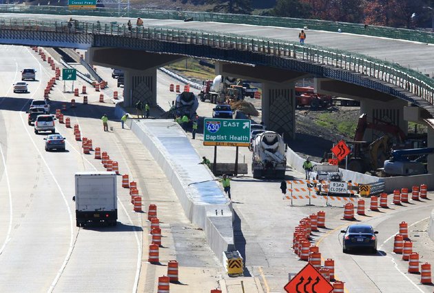 arkansas-democrat-gazettestaton-breidenthal-111312-workers-continue-the-construction-tuesday-morning-at-the-interstate-430interstate-630-interchange-motorist-will-face-periodic-lane-closures-at-the-site-between-9-am-and-3-pm-through-friday