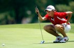 Summar Roachell lines up her putt on the first green at Pinnacle Country Club in Rogers on Monday, June 25, 2012, during the qualifying round for the Wal-Mart NW Arkansas Championship.