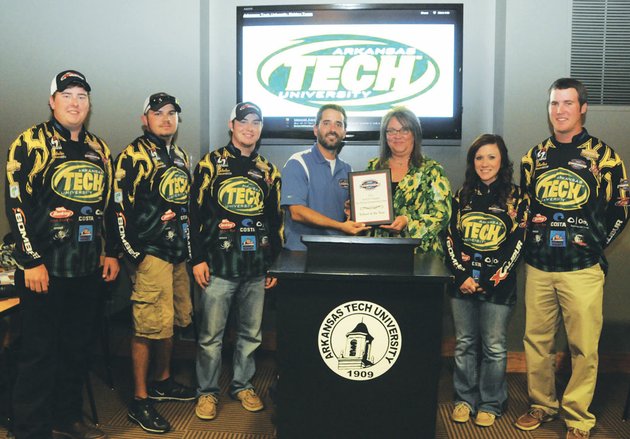the-arkansas-tech-fishing-club-recently-won-the-inaugural-association-of-collegiate-anglers-school-of-the-year-award-danny-blandford-center-program-director-for-the-associate-of-collegiate-anglers-presented-the-plaque-to-christy-austin-co-sponsor-of-the-club-at-a-banquet-held-at-arkansas-tech-university-others-accepting-the-honor-included-from-the-left-fishing-club-members-clayton-schuh-evan-barnes-aaron-sarna-reagan-moore-and-evan-smith