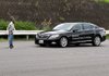 A Lexus sedan stops short of hitting a dummy during a demonstration of a braking safety feature at a Toyota Motor Corp. testing facility in Sunsono, Japan, in 2011. 