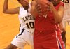 Little Rock Central’s Alaysia Ready (left) and Little Rock Parkview’s Sausha Davey fight for a rebound during the first half of the Tigers’ 53-45 loss to the Patriots on Wednesday at Little Rock Hall High School. 