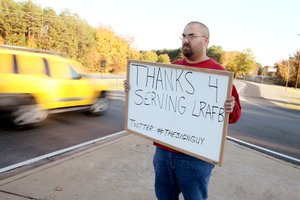 Joe Sachs makes a habit of standing outside the main gate to Little Rock Air Force Base with a sign thanking soldiers for serving the country. 
