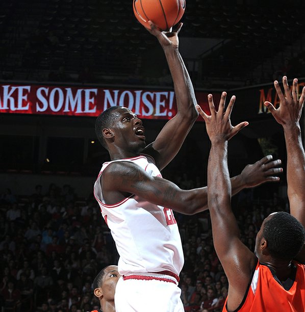 Jacorey Williams attempts a shot ...