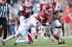 Knile Davis will play at Mississippi State. 