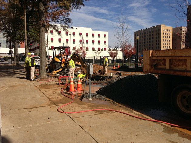 crews-work-thursday-nov-15-2012-to-repair-a-broken-water-main-at-louisiana-and-third-streets-in-downtown-little-rock