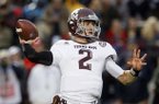 Texas A&M quarterback Johnny Manziel won the Heisman Trophy, outscoring runner-up Manti Teo by more than 300 Heisman voting points. (AP Photo/Rogelio V. Solis)