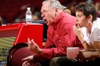 Tom Collen instructs his team from the sidelines of an exhibition win in Fayetteville. 