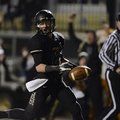 STAFF PHOTO MARC F. HENNING -- Bentonville defensive back Austin Haggard scores a touchdown after st...