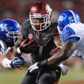 Running back Knile Davis (center), who has missed two games with a hamstring injury, has been cleare...