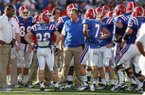 In this Nov. 3, 2012 photo, Louisiana Tech head football coach Sonny Dykes talks with his team during an NCAA college football game against Texas-San Antonio at Joe Aillet Stadium in Ruston, La. (AP Photo/The El Dorado News-Times, Michael Orrell)