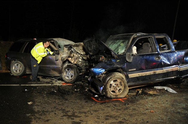 emergency-personnel-work-the-scene-of-a-multiple-fatality-accident-on-arkansas-7-south-of-hot-springs-on-thursday-nov-15-2012