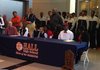Hall center Bobby Portis (right), along with Lady Warriors Tyler Scaife (center) and Katelyn Weber all signed with colleges at a ceremony on Friday afternoon at Cirks Arena.