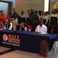 Hall center Bobby Portis (right), along with Lady Warriors Tyler Scaife (center) and Katelyn Weber a...