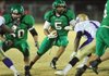 Calvin Jones of Greenland looks for a hole in the Osceola defense during the first half of Friday night’s game in Greenland.