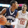 NWA Media/ANDY SHUPE -- Arkansas sophomore guard Rashad Madden (00) pressures Longwood junior guard ...