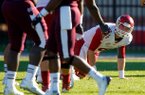 NWA Media/JASON IVESTER -- Arkansas senior quarterback Tyler Wilson gets up from the field after being sacked by the Mississippi State defense during the fourth quarter on Saturday, Nov. 17, 2012, at Davis Wade Stadium in Starkville, Miss.