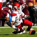 Mississippi State linebacker Benardrick McKinney (left) and Arkansas punt returner Kaelon Kelleybrew...