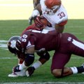 Dennis Johnson caught a pass a 7-yard touchdown pass from Tyler Wilson, getting past Benardrick McKi...