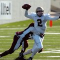 Matt Simpson, former Shiloh Christian quarterback, looks for a receiver in the 3A State Championship...