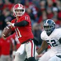 Georgia quarterback Aaron Murray (11) throws under pressure from Georgia Southern defensive end Javo...