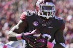 Chris Gragg celebrates following a 41-yard touchdown against Ole Miss on Oct. 27 at War Memorial Stadium. 