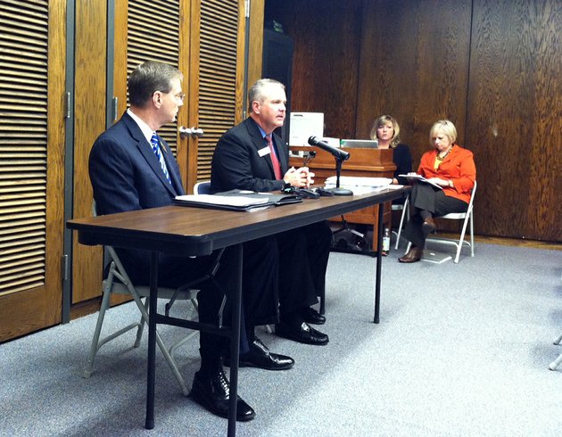 arkansas-department-of-education-commissioner-tom-kimbrell-at-the-microphone-and-greg-murry-the-conway-school-district-superintendent-release-monday-nov-19-2012-the-2012-school-accountability-reports