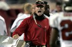 Jon Gruden continues to be associated with the Arkansas job. 