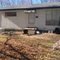 White flowers were placed on the porch of Jersey Bridgeman's home Wednesday.