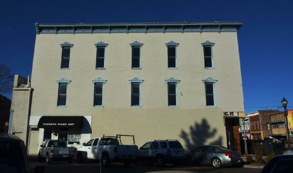 
                               
                                  Photo by Michael Woods&mdash;
                               
                           
                           The old Dixieland shoe store on the corner of Walnut and 1st street in Rogers Wednesday morning.  John Mack, owner of JKJ Architects, recently purchase the former Dixieland Shoe store on the corner of First and Walnut street. He is restoring the building which includes the Opera House on the second floor, once a grand theater.
