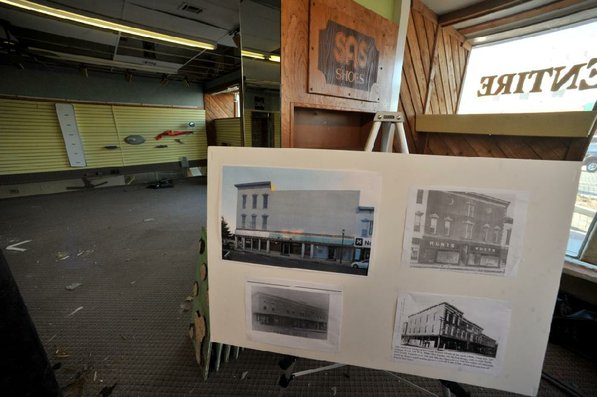 
                               
                                  Photo by Michael Woods&mdash;
                               
                           
                           The first floor of the old Dixieland shoe store on the corner of Walnut and 1st street in Rogers Wednesday morning.  John Mack, owner of JKJ Architects, recently purchase the former Dixieland Shoe store. He is restoring the building which includes the Opera House on the second floor, once a grand theater.
