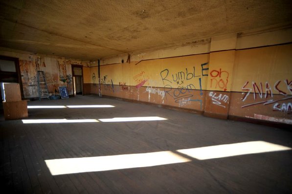 
                               
                                  Photo by Michael Woods&mdash;
                               
                           
                           Sunlight falls into a third floor room on the north east corner of the old opera house in the old Dixieland shoe store on the corner of Walnut and 1st street in Rogers Wednesday morning.  John Mack, owner of JKJ Architects, recently purchase the former Dixieland Shoe store. He is restoring the building which includes the Opera House on the second floor, once a grand theater.