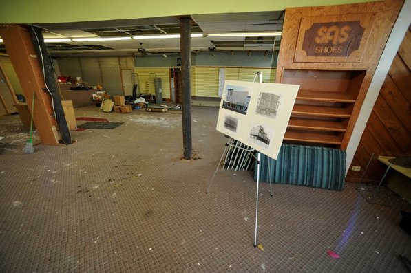 
                               
                                  Photo by Michael Woods&mdash;
                               
                           
                           The first floor of the old Dixieland shoe store on the corner of Walnut and 1st street in Rogers Wednesday morning.  John Mack, owner of JKJ Architects, recently purchase the former Dixieland Shoe store. He is restoring the building which includes the Opera House on the second floor, once a grand theater.