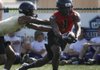 Jonesboro senior tailback Martin Stafford (right) set school records for single-season and career rushing yardage in last week’s 45-21 victory over Lake Hamilton in the quarterfinals of the Class 6A playoffs. 