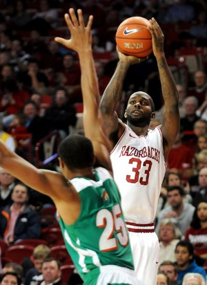 Arkansas forward Marshawn Powell (right), who finished with 21 points and 10 rebounds in Tuesday’s 89-60 victory over Florida A&M, said the Razorbacks are ready to do what they do against Arizona State. 