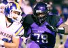 El Dorado News-Times/Michael Orrell -- El Dorado's Bijhon Jackson tracks Mountian Home's Andrew Stolpe in the first round of the 6A state playoffs at Memorial Stadium in El Dorado on Friday, Nov. 9, 2012. 