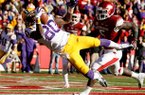NWA Media/JASON IVESTER -- LSU wide receiver Jarvis Landry makes a catch for a touchdown in front of Arkansas linebacker Otha Peters during the second quarter on Friday, Nov. 23, 2012, at Donald W. Reynolds Razorback Stadium in Fayetteville.
