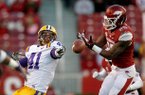 Arkansas linebacker Terrell Williams (right) breaks up a pass intended for Louisiana State tight end Travis Dickson during the fourth on Friday, Nov. 23, 2012, at Donald W. Reynolds Razorback Stadium in Fayetteville.